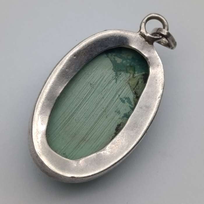 Variscite faceted cabochon 11g with silver surround - stone about 25 carat