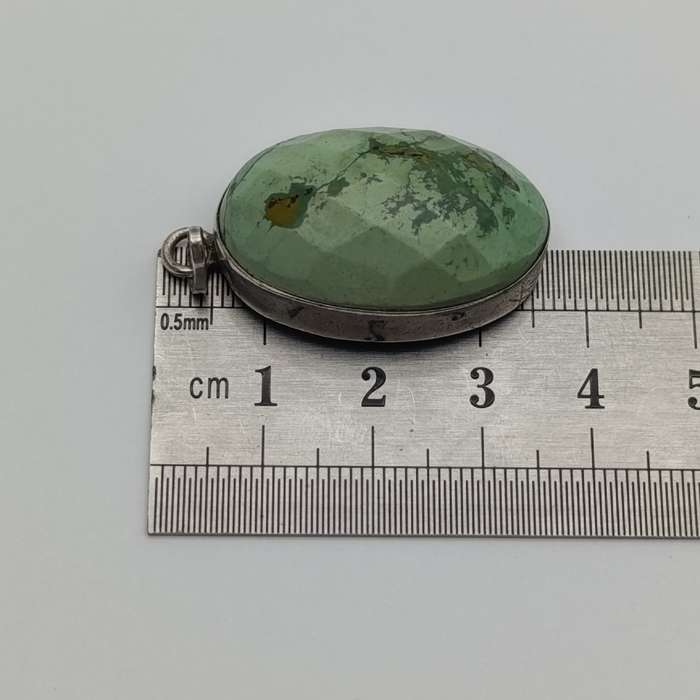 Variscite faceted cabochon 11g with silver surround - stone about 25 carat