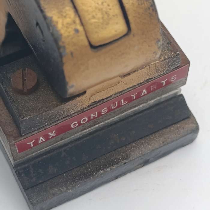 Antique embossing tool for "W.Breytenbach & Co. Tax consultants"