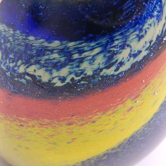 Vintage glass paperweight with colourful spiral