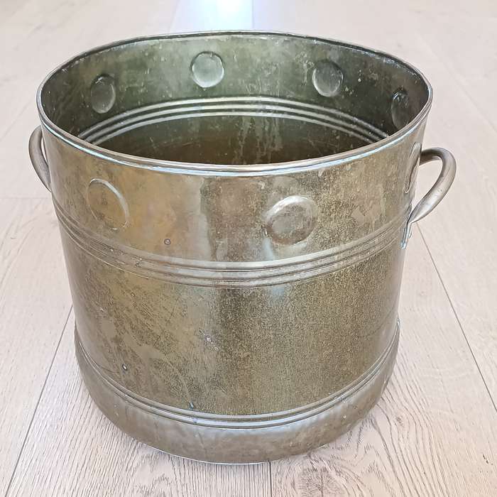 Large brass two-handled bucket