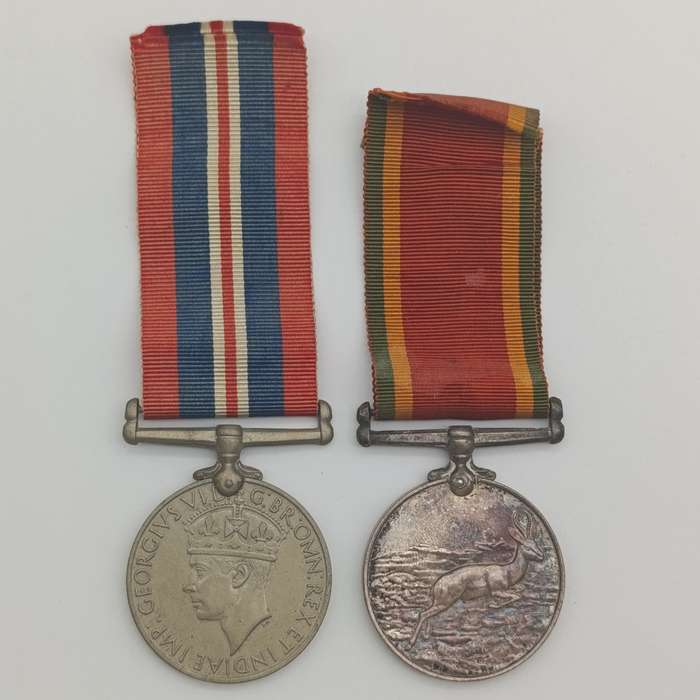 Pair of WW2 medals issued to 214152 C.J. maker