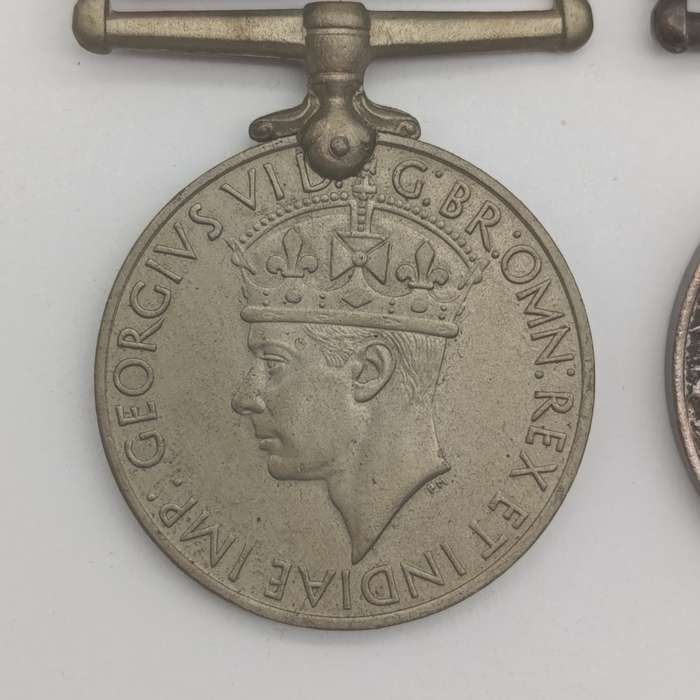 Pair of WW2 medals issued to 214152 C.J. maker