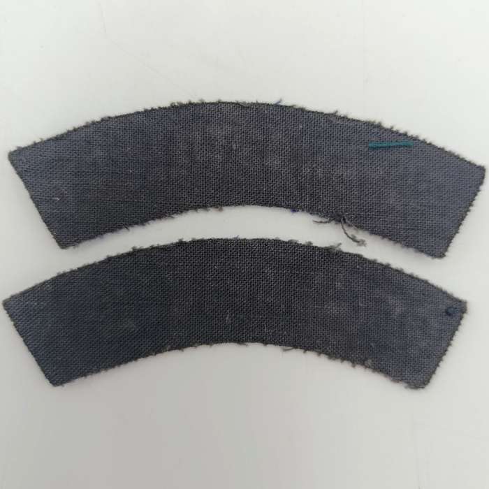 Pair of Royal Artillery cloth shoulder titles
