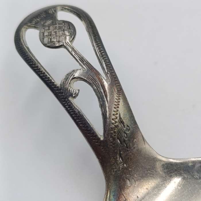Antique Scottish silverplated tea caddy spoon with thistle design