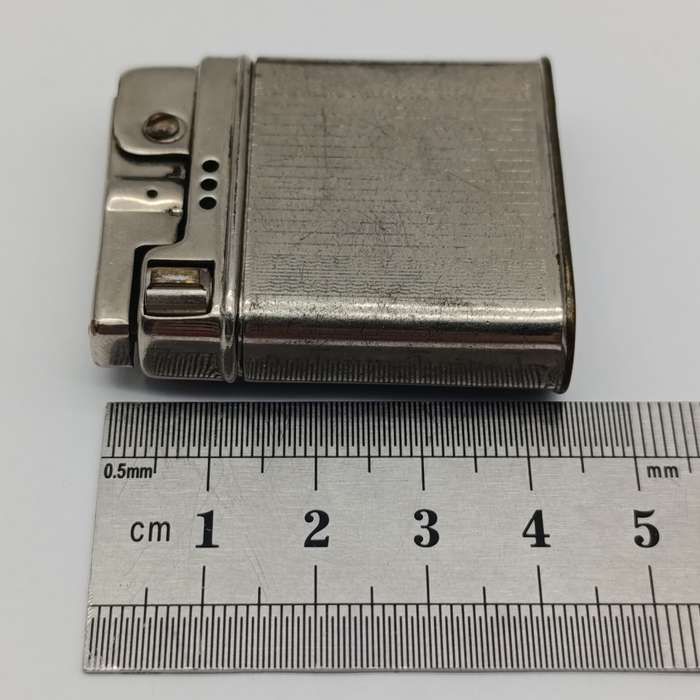 Vintage Rowonta pocket lighter with Claas advertising - working