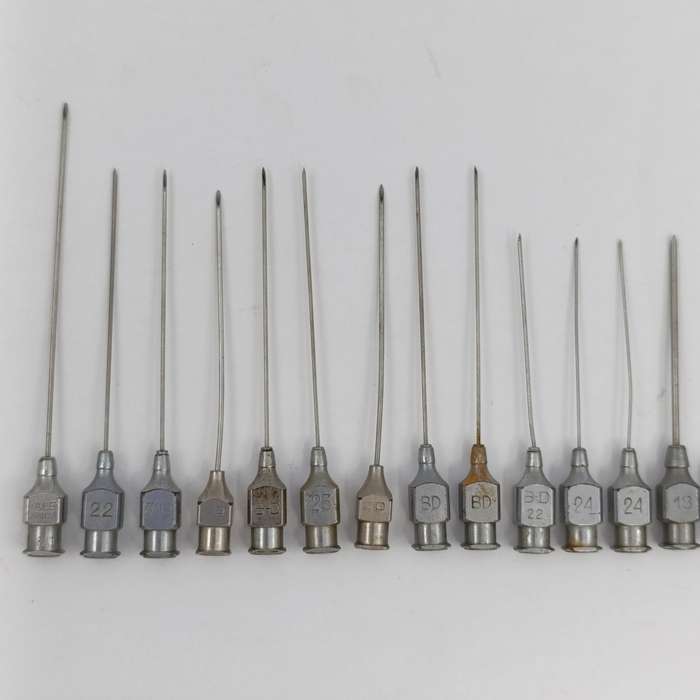 Vintage glass syringe holder/ sterilizer with 20 vintage syringe needles