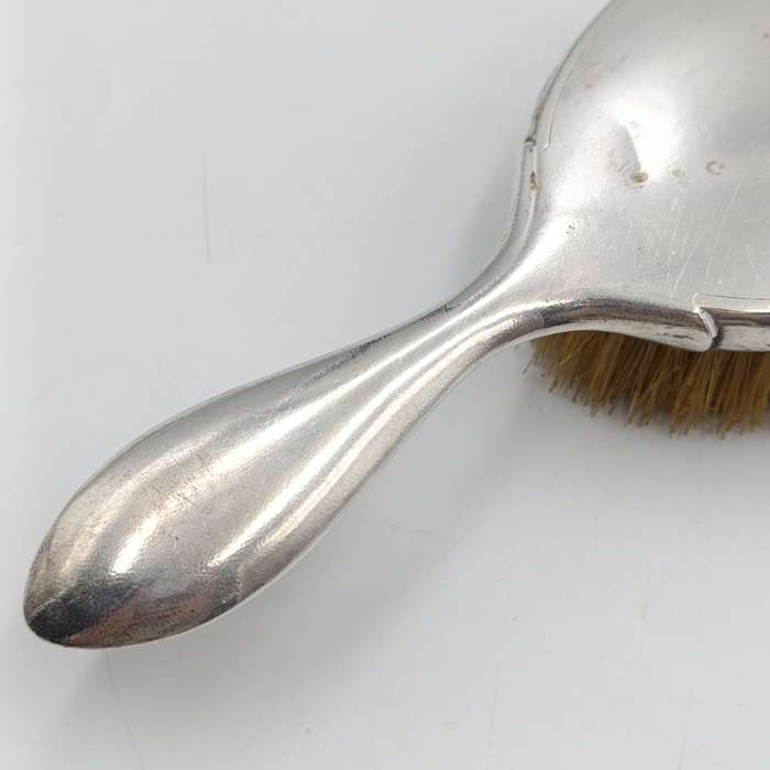 Antique Luen WO silver dressing table set with brush, shoe horn and boot lace puller