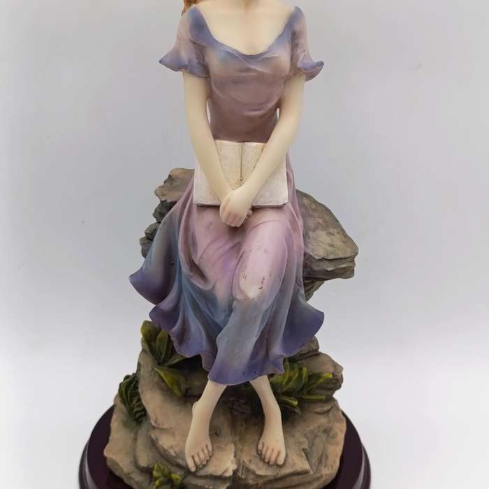 Beautiful Angelica Collection poly resin figurine of girl with book