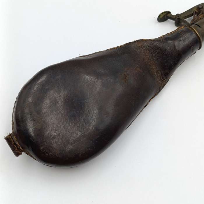 Antique musket ball pouch with brass applicator