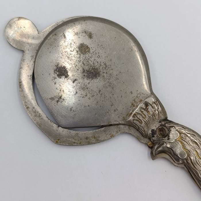 Vintage candle snuffer with rooster