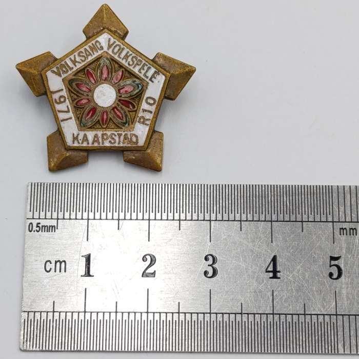 Pair of sterling silver Volkspele brooches plus R10 donation brooch
