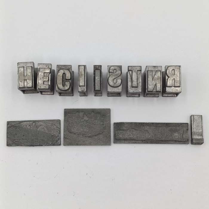 Lot of 13 metal letter and shape press block
