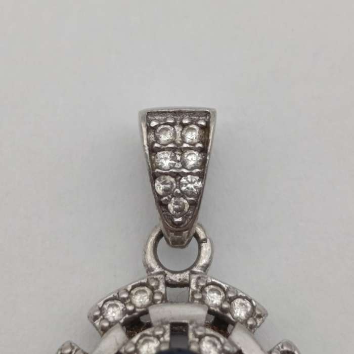 Sterling silver pendant with blue and clear stones - weighs 1.7g