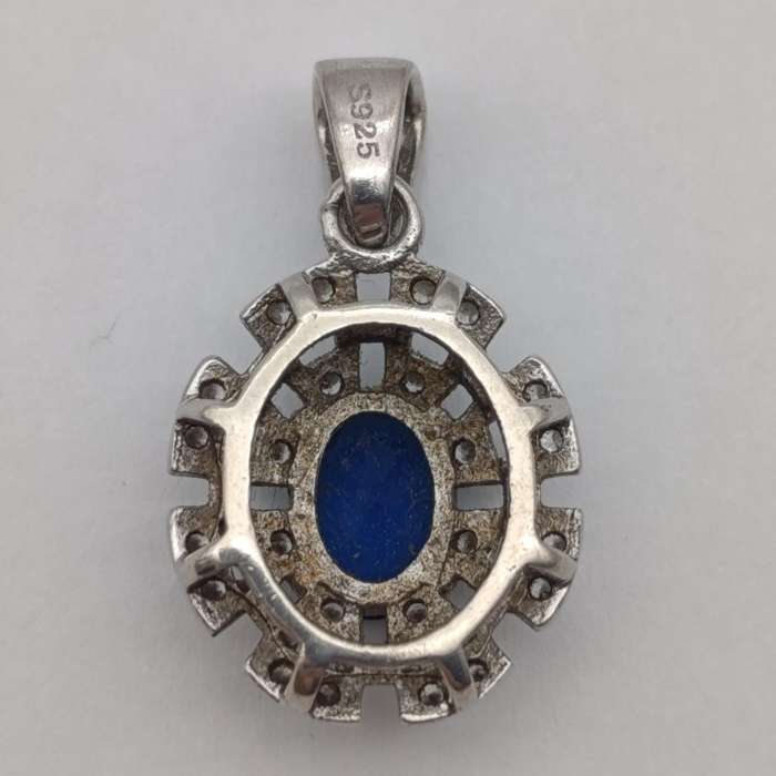 Sterling silver pendant with blue and clear stones - weighs 1.7g