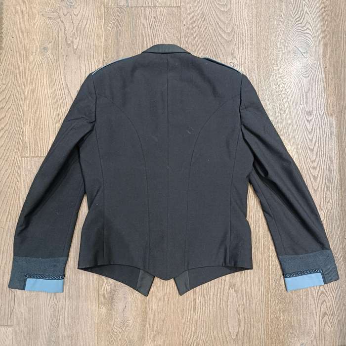 Sa Air Force Mess dress tunic of Captain MJ McFall with ranks and suspenders