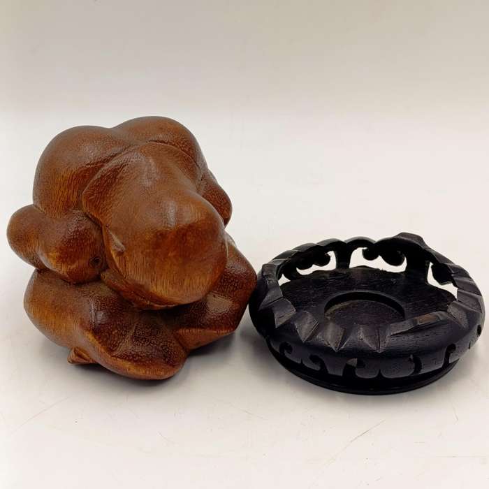 Handcarved wooden weeping buddha sculpture