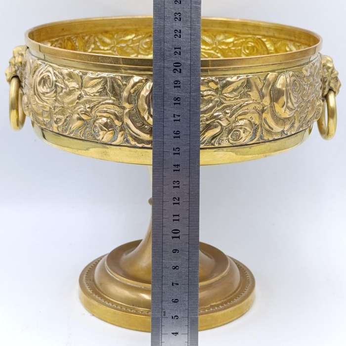 Vintage brass fruit bowl with brass lion head handles