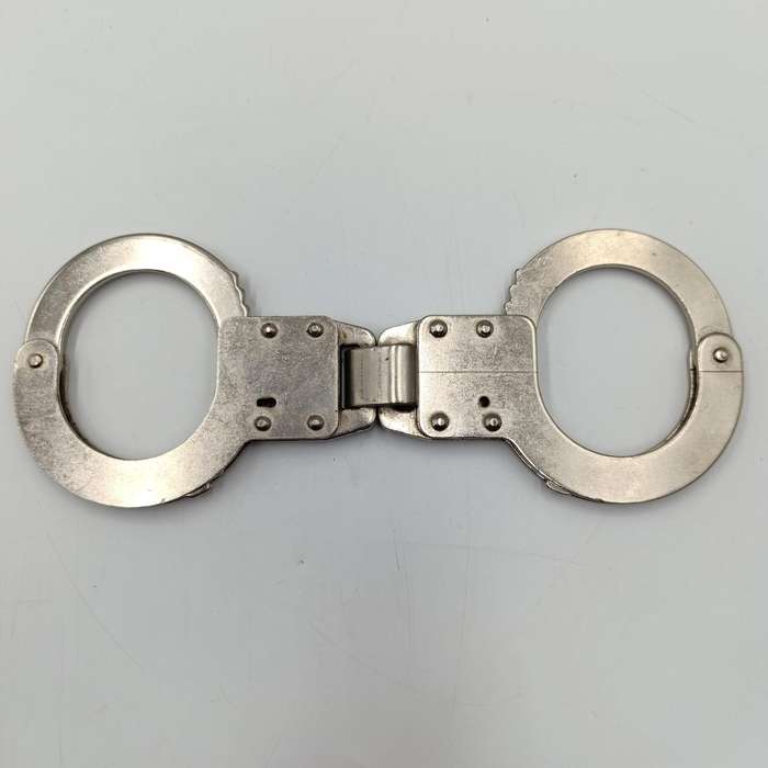 Vintage leather handcuff pouch with handcuffs