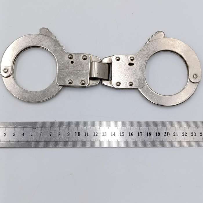 Vintage leather handcuff pouch with handcuffs