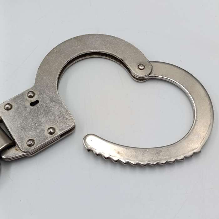 Vintage leather handcuff pouch with handcuffs