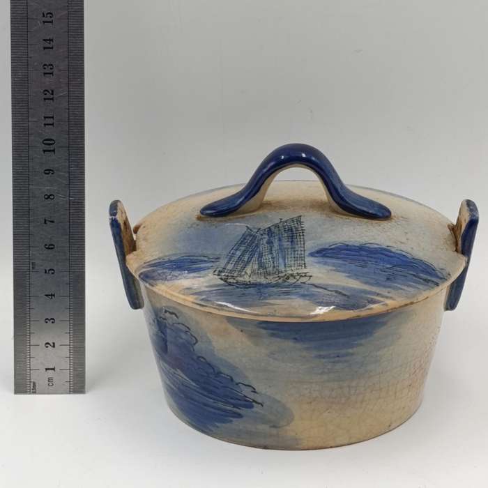 Antique blue and white pottery dish with lid