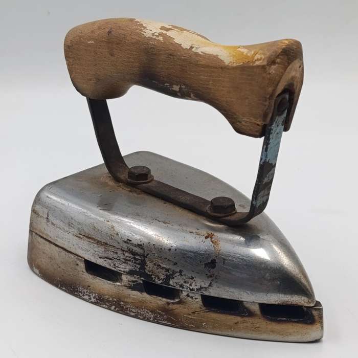 Vintage gas heated sad iron with heating stand