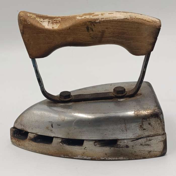 Vintage gas heated sad iron with heating stand