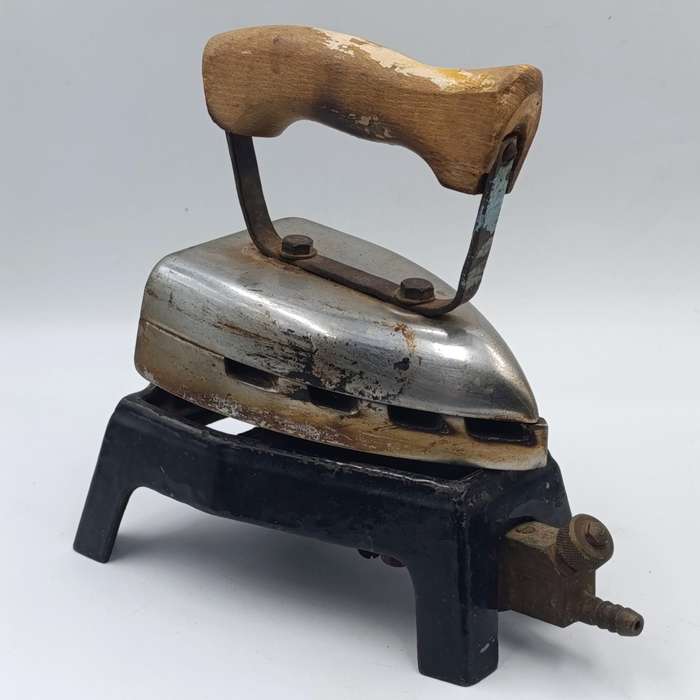 Vintage gas heated sad iron with heating stand