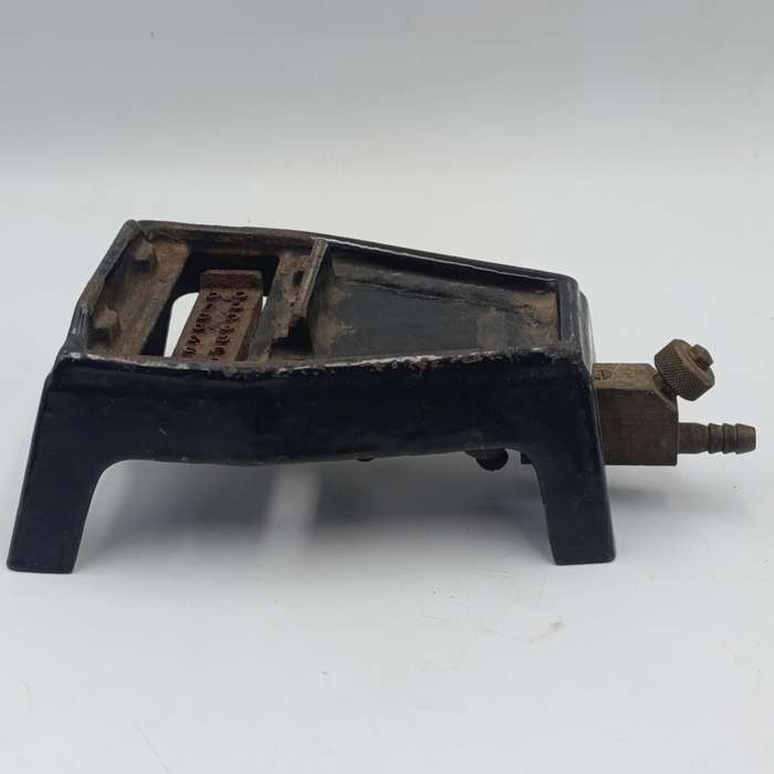 Vintage gas heated sad iron with heating stand