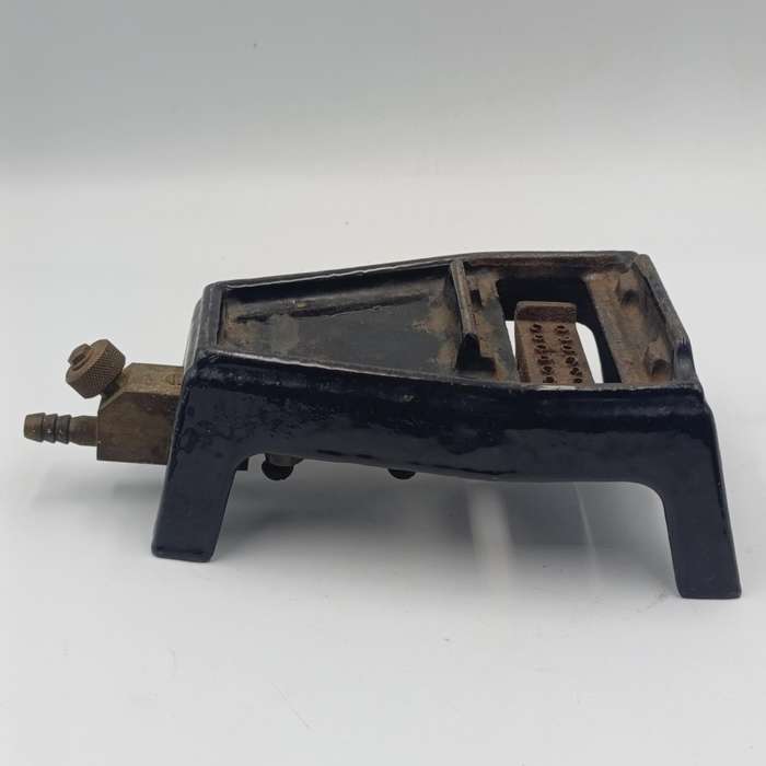 Vintage gas heated sad iron with heating stand