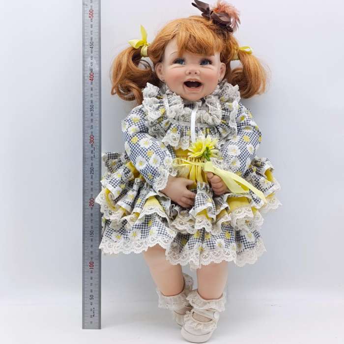 Beautiful little girl porcelain doll with soft body - Height 50cm - with stand