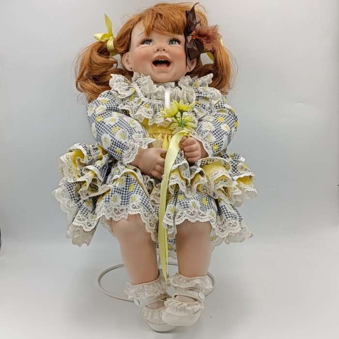 Beautiful little girl porcelain doll with soft body - Height 50cm - with stand