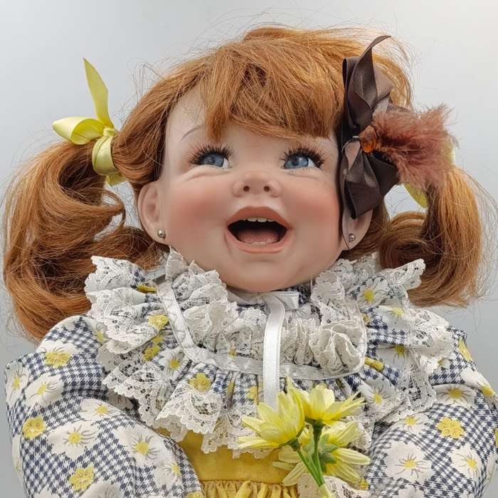 Beautiful little girl porcelain doll with soft body - Height 50cm - with stand