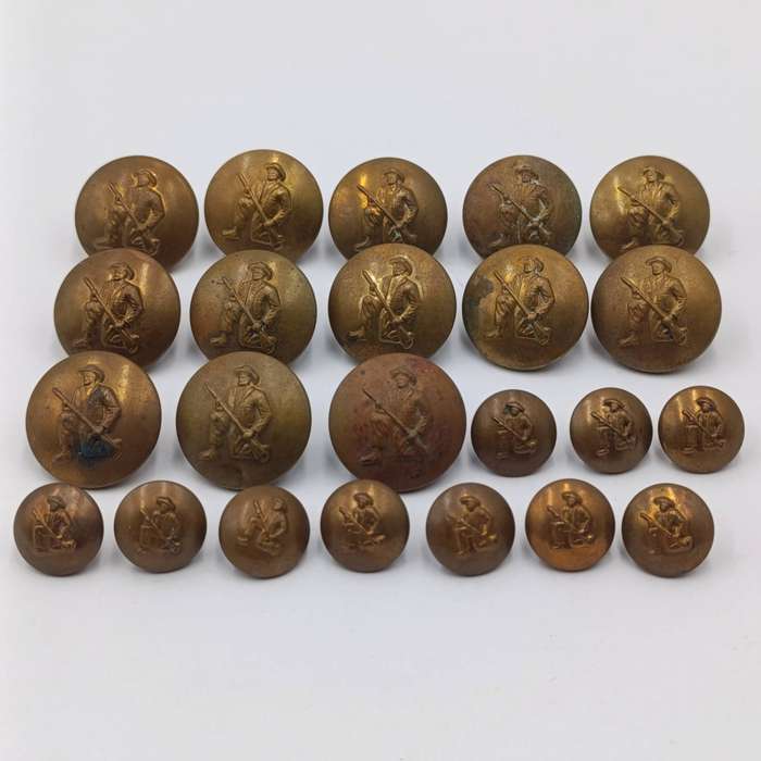Lot of 23 SADF commando uniform buttons