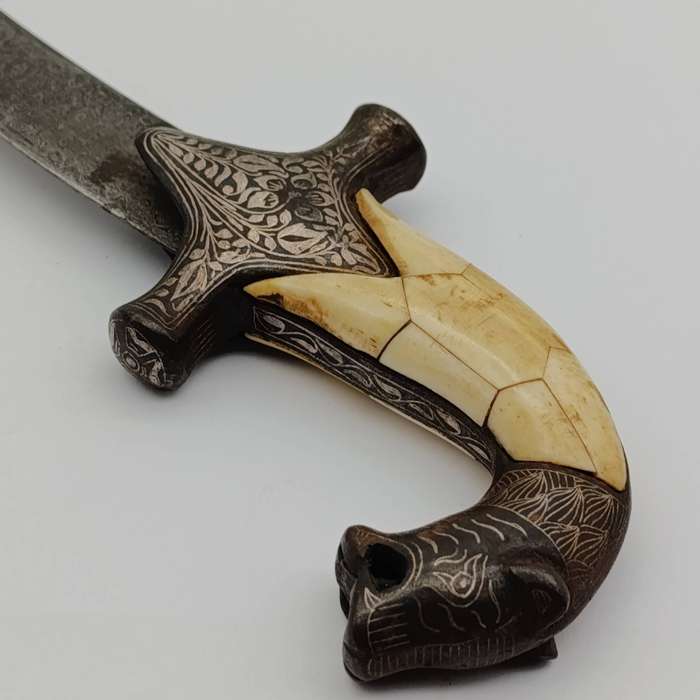 Vintage Indo-Persian damascus dagger with bone handle