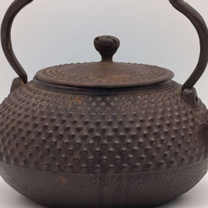 Antique 19th century Japanese cast iron teapot with makers mark below spout