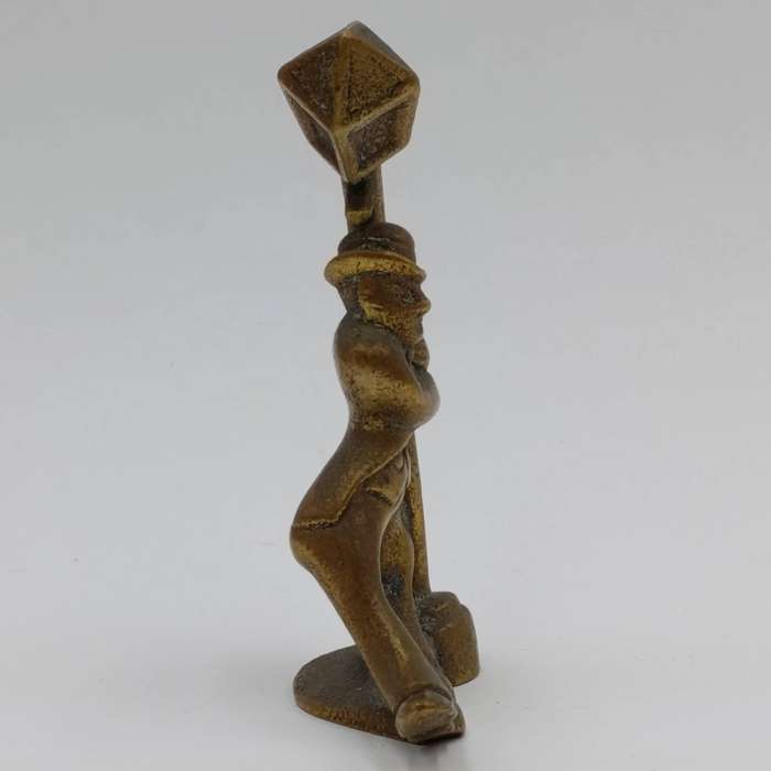 Vintage drunk man leaning on lamp post figurine