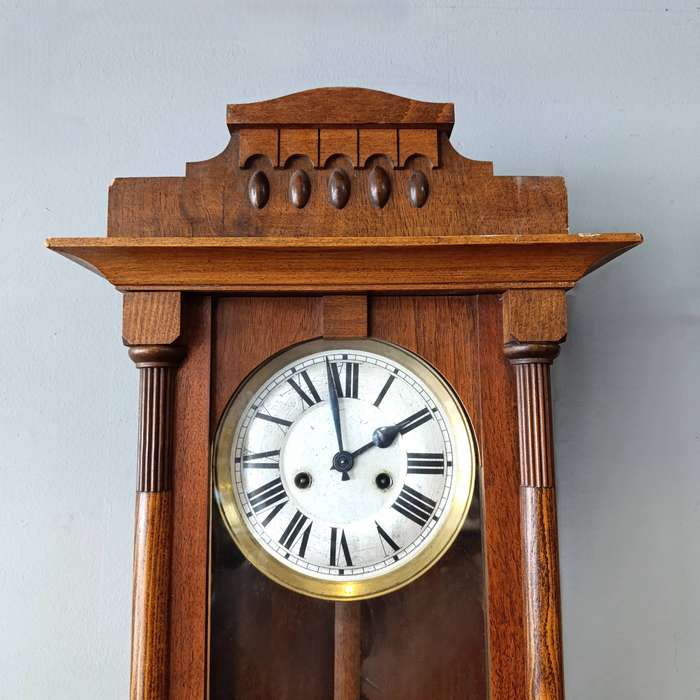 Antique wooden wall hanging clock