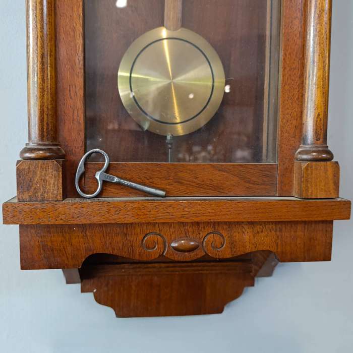 Antique wooden wall hanging clock
