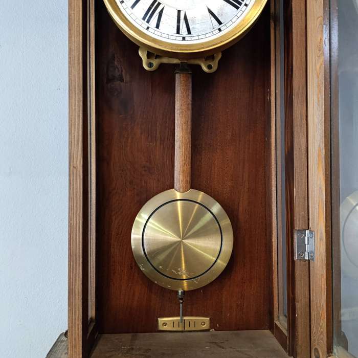 Antique wooden wall hanging clock