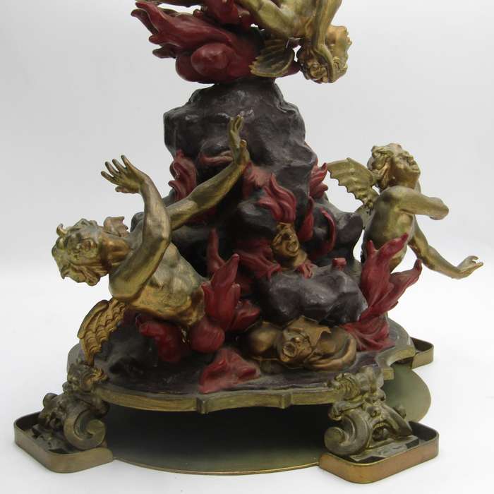 Vintage Large bronze statue of Archangel Michael casting the devil and demons into hell.
