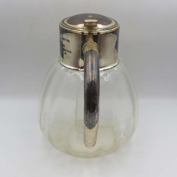 Vintage glass pitcher with silverplated top presented to SADF Chief of Staff Lieutenant - General J.