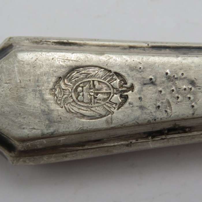 Antique pickle fork with ZAR Transvaal coat of arms on handle.