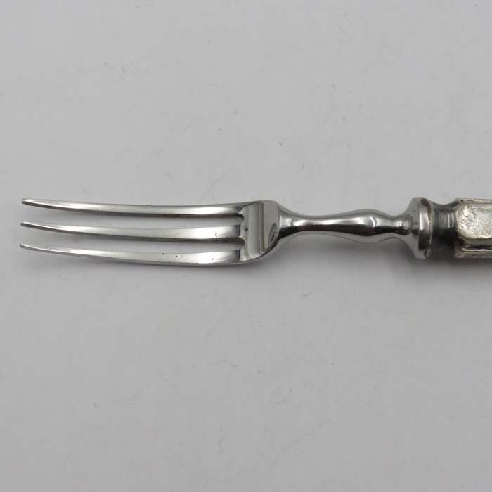 Antique pickle fork with ZAR Transvaal coat of arms on handle.
