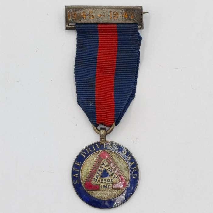 1945-1947 Safe Driving Award medal issued to TD 1150 J. Lutley