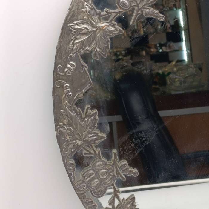 Antique oval mirror with grapevine pewter atrwork frame