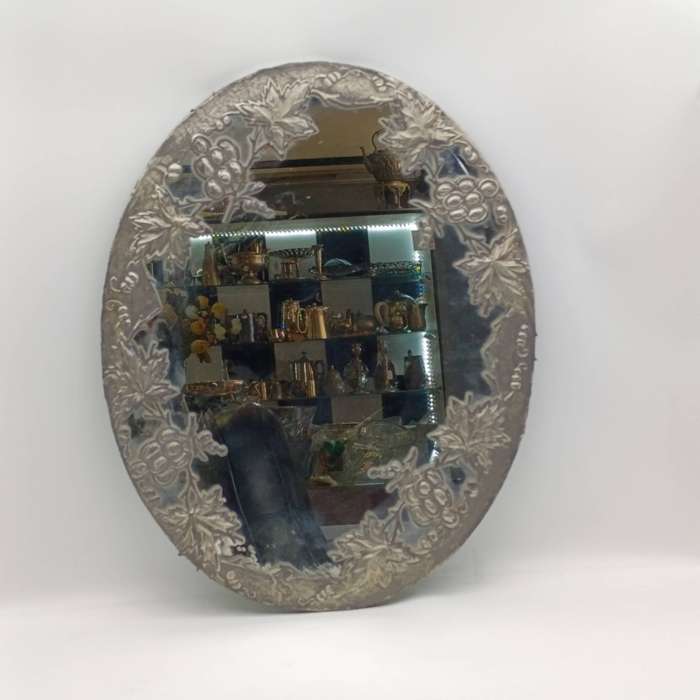 Antique oval mirror with grapevine pewter atrwork frame