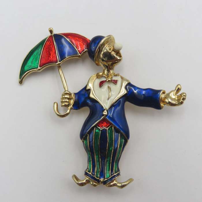 Vintage gold colour with enamel clown brooch