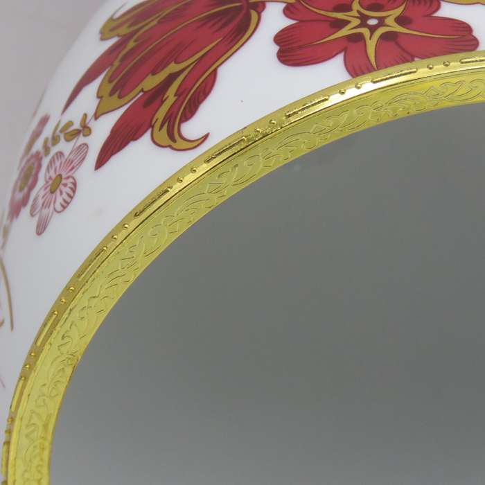 Vintage Hinged porcelain Jewellery / trinket egg on legs